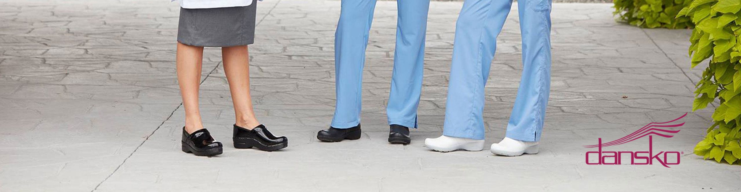 Group of people wearing Dansko shoes.